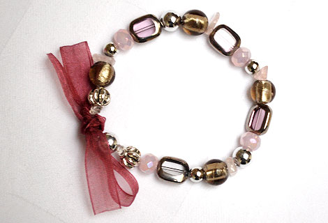 Anna pink/silver/gold bracelet - Lovely, easy-to-wear slip on bracelet, with pink, silver and gold beads, and finished off with a burgundy organza ribbon bow.