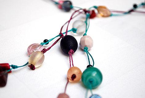 Mari Jo green/pink/blue long knotted lariat - Striking mixed bead lariat necklace designed to be worn to the navel. Strung and knotted onto double thread. Fixed front fastening.
