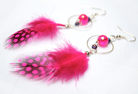 Danni earrings - feather drop earrings.