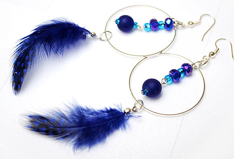Danni earrings - feather drop earrings.