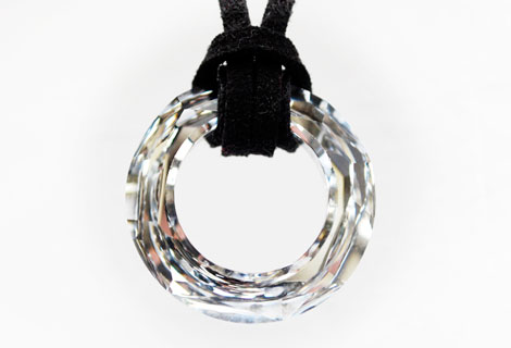 Annette Swarovski crystal pendant - A stunning ring of sparkling Swarovski clear crystal strung and double-looped on to black suede. Sterling silver lobster clasp and chain.