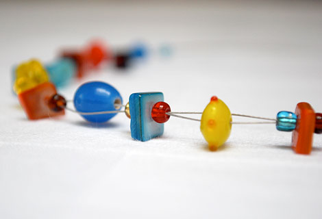 Jellybean wire threaded necklace - Pretty cluster of coloured beads, woven together with thin silver wire. Strung onto a single wire. Magnetic clasp.